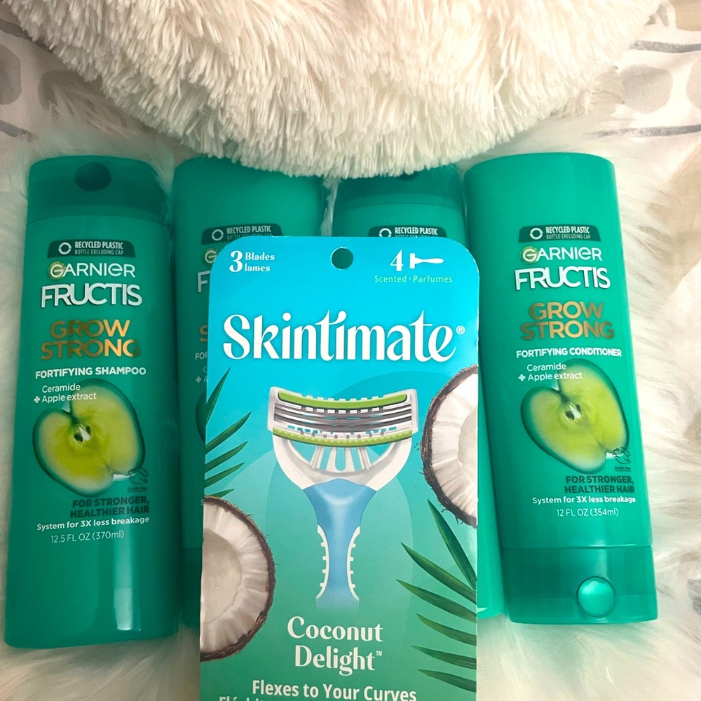 2 Sets of Garnier Fructis Shampoo & Conditioner and a pack of Skintimate Razors